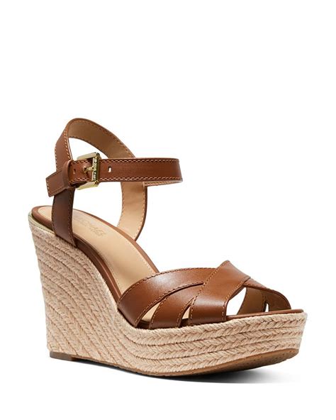 michael michael kors women's suzette espadrille wedge heel sandals|Michael Kors open toe sandals.